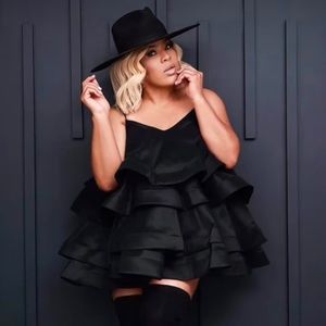 On and Off the RunWay Black Tiered Dress. Brand New With Tags attached.